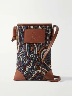 Leather-trimmed embroidered canvas shoulder bag